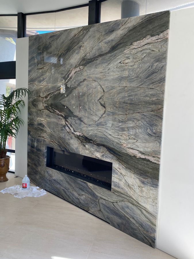 Blue quartzite fireplace surround wall