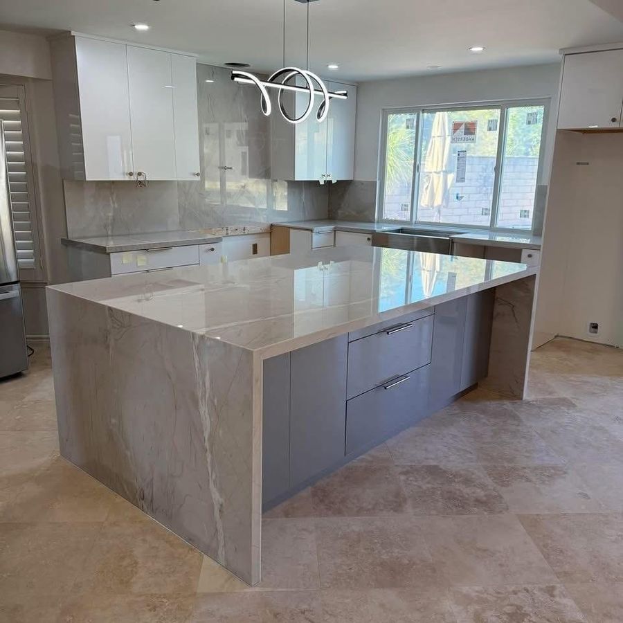 Modern kitchen with waterfall marble island
