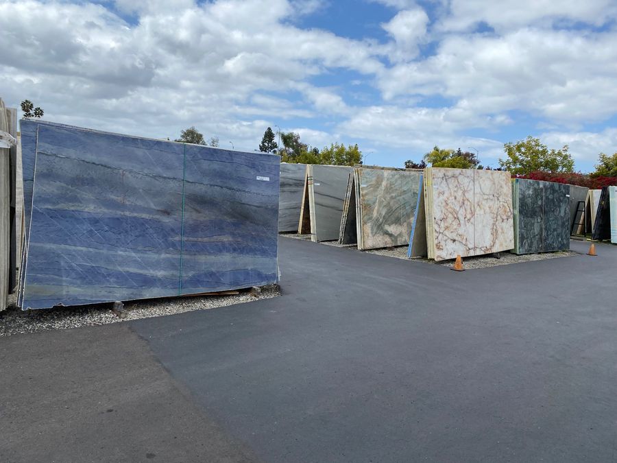 Slab yard featuring blue quartzite and natural stone